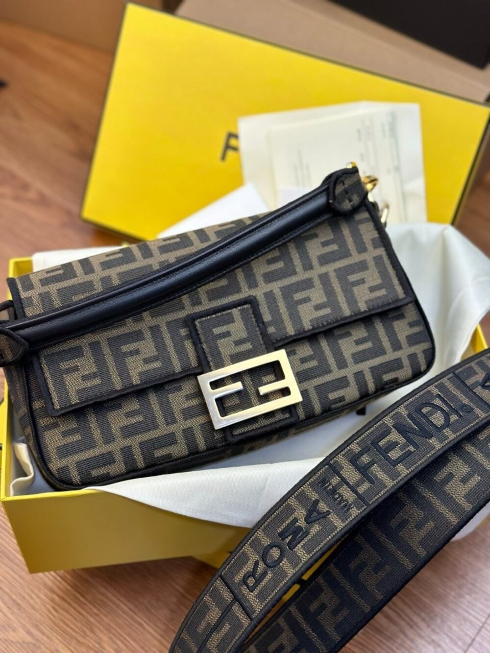 Fendi monogram baguette bag with gold buckle